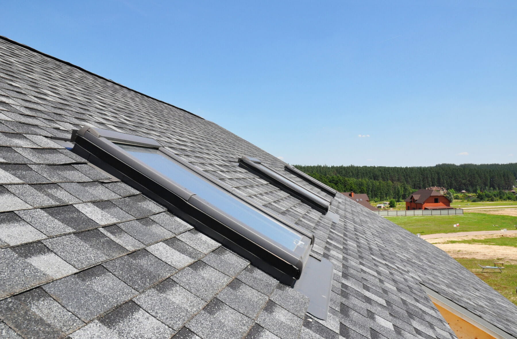 Skylights on asphalt shingle roof